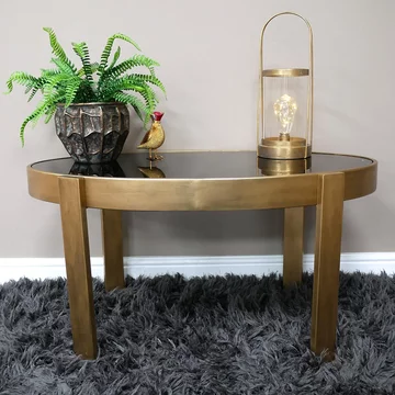 Coffee table - black and brass - glass and metal