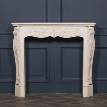 Aged ivory fire surround - hand carved