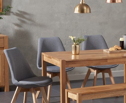 York 150cm solid oak dining table with 2 dark grey orson chairs and 2 oak benches