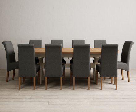 Extending olympia 180cm oak and cream painted dining table with 10 charcoal grey scroll back chairs