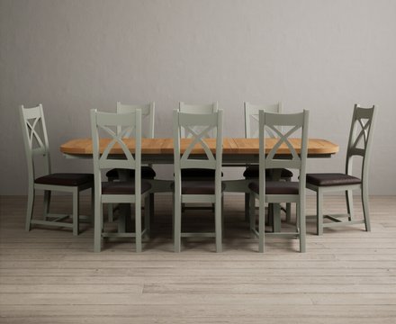 Extending olympia 180cm oak and soft green dining table with 8 brown painted chairs