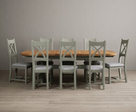 Extending olympia 180cm oak and soft green dining table with 8 light grey painted chairs