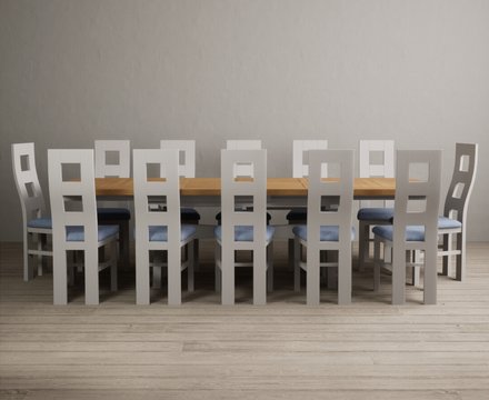Extending olympia 180cm oak and soft white painted dining table with 12 blue painted chairs