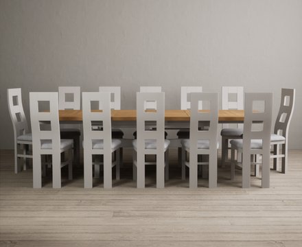 Extending olympia 180cm oak and soft white painted dining table with 12 light grey painted chairs