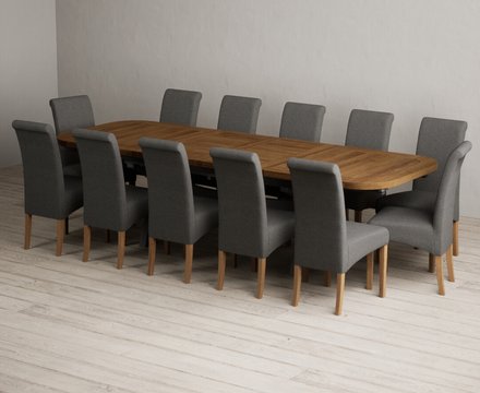 Extending olympia 180cm oak and charcoal grey dining table with 12 charcoal grey scroll back chairs