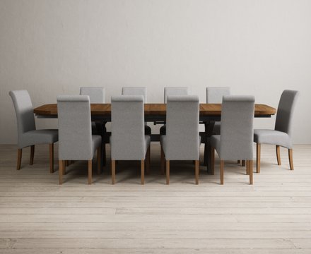 Extending olympia 180cm oak and charcoal grey dining table with 12 grey scroll back chairs