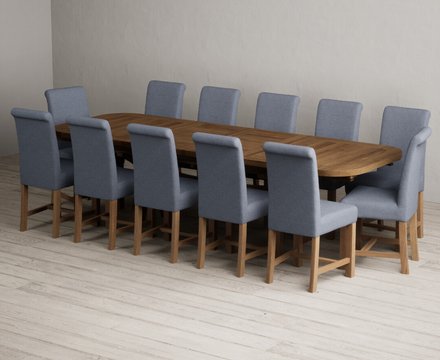 Extending olympia 180cm rustic solid oak dining table with 12 blue braced chairs