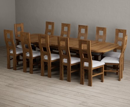 Extending olympia 180cm rustic solid oak dining table with 12 light grey rustic solid oak chairs
