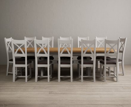 Extending olympia 180cm oak and soft white painted dining table with 12 brown painted chairs