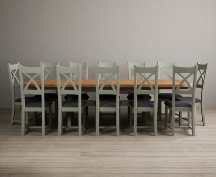 Extending olympia 180cm oak and soft green dining table with 12 charcoal grey painted chairs