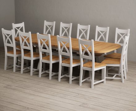 Extending olympia 180cm oak and soft white painted dining table with 12 oak painted chairs