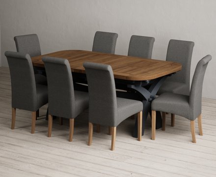 Extending olympia 180cm oak and dark blue dining table with 8 charcoal grey scroll back chairs