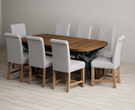Extending olympia 180cm oak and dark blue dining table with 8 grey braced chairs