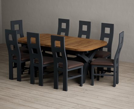 Extending olympia 180cm oak and dark blue dining table with 8 brown painted chairs