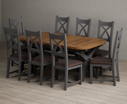 Extending olympia 180cm oak and charcoal grey dining table with 8 brown painted chairs