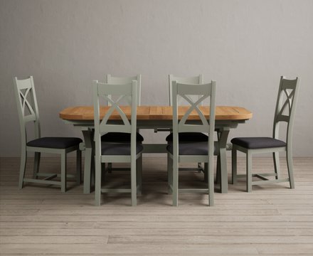Extending olympia 180cm oak and soft green dining table with 6 charcoal grey painted chairs