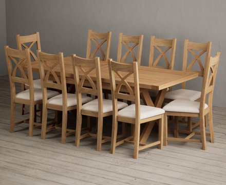 Extending buckley 160cm solid oak dining table with 10 linen natural solid oak chairs