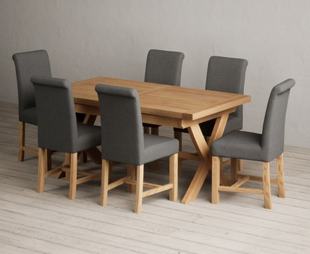 Extending buckley 160cm solid oak dining table with 6 charcoal grey braced chairs