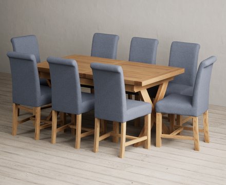 Extending buckley 160cm solid oak dining table with 8 blue braced chairs