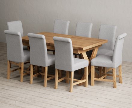 Extending buckley 160cm solid oak dining table with 8 grey braced chairs