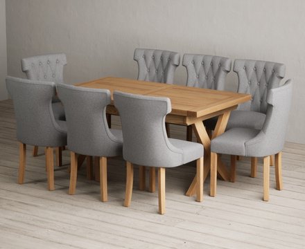 Extending buckley 160cm solid oak dining table with 8 grey clara chairs