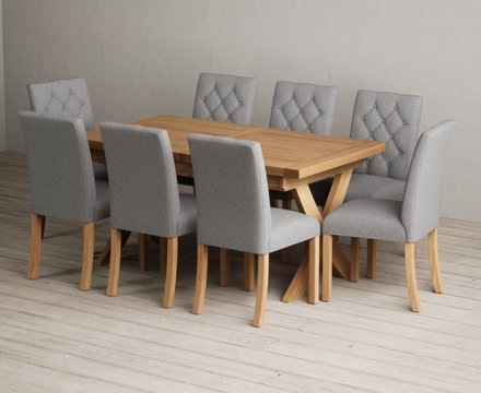 Extending buckley 160cm solid oak dining table with 8 grey isabella chairs