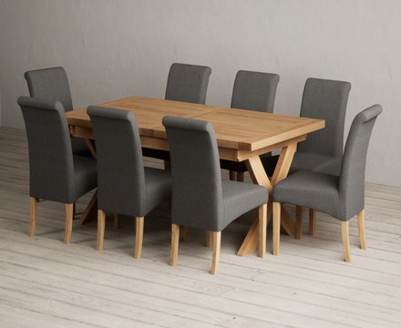 Extending buckley 160cm solid oak dining table with 8 charcoal grey scroll back chairs