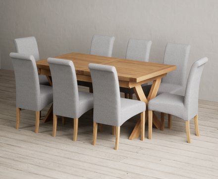 Extending buckley 160cm solid oak dining table with 8 grey scroll back chairs
