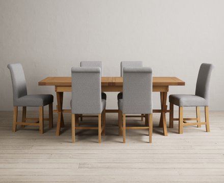 Extending buckley 200cm solid oak dining table with 6 grey braced chairs