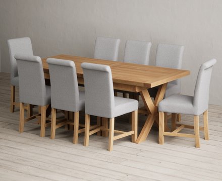 Extending buckley 200cm solid oak dining table with 8 grey braced chairs