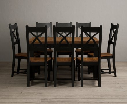 Extending buxton 140cm oak and black painted dining table with 8 rustic oak painted chairs