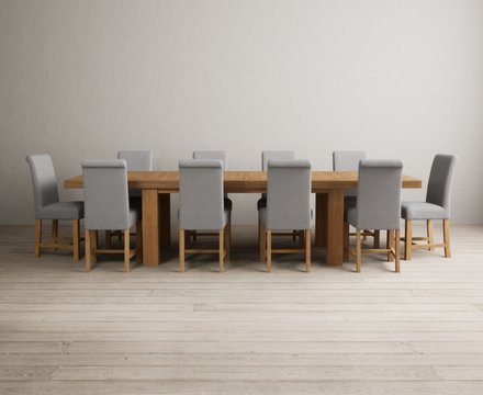 Extending callington 230cm oak dining table with 12 grey braced chairs