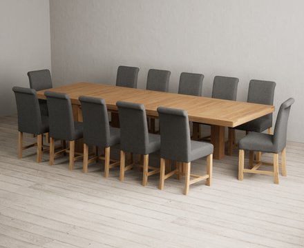 Extending callington 230cm oak dining table with 12 charcoal grey braced chairs