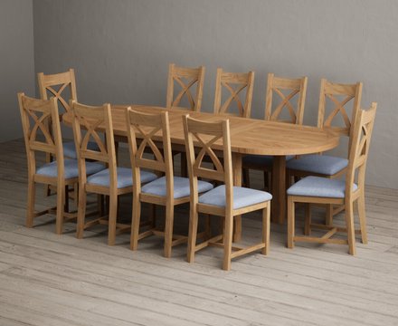 Extending caversham oak oval dining table with 10 blue natural solid oak chairs