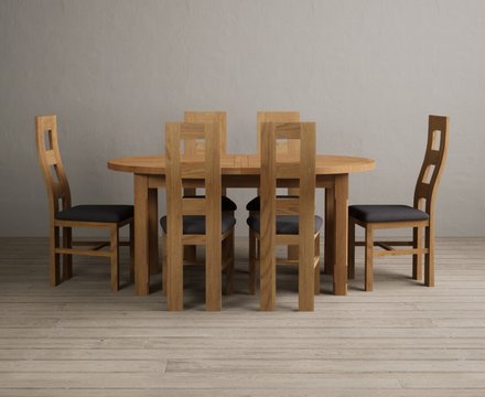 Extending caversham oak oval dining table with 6 charcoal grey natural chairs