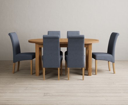 Extending caversham oak oval dining table with 6 blue scroll back chairs