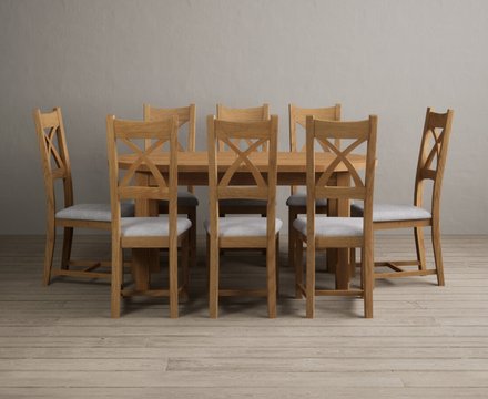 Extending caversham oak oval dining table with 8 light grey natural solid oak chairs