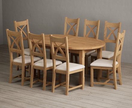 Extending caversham oak oval dining table with 8 linen natural solid oak chairs