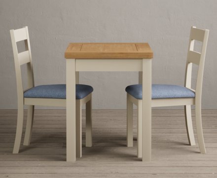 Extending hadleigh oak and cream painted dining table with 2 blue kendal chairs