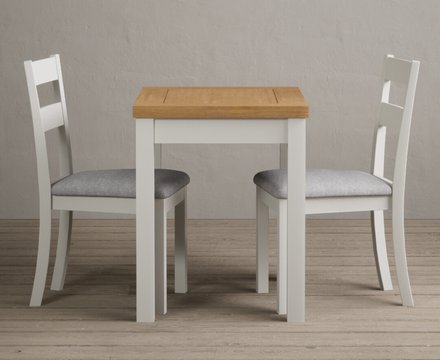 Extending hadleigh oak and signal white painted dining table with 2 light grey kendal chairs