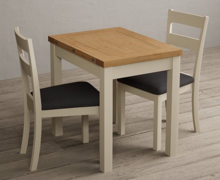 Extending hadleigh oak and cream painted dining table with 2 charcoal grey kendal chairs