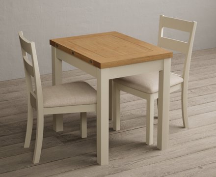 Extending hadleigh oak and cream painted dining table with 6 linen kendal chairs