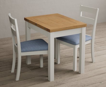 Extending hadleigh oak and signal white painted dining table with 2 blue kendal chairs