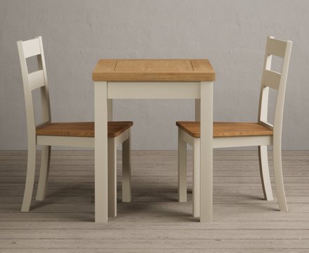 Extending hadleigh oak and cream painted dining table with 2 oak kendal chairs