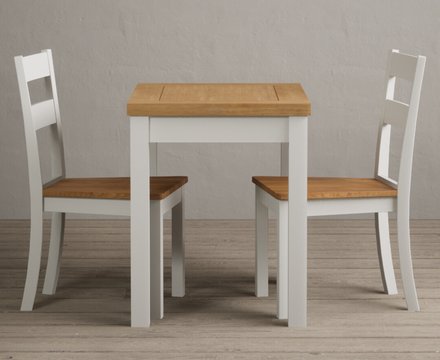 Extending hadleigh oak and signal white painted dining table with 2 oak kendal chairs