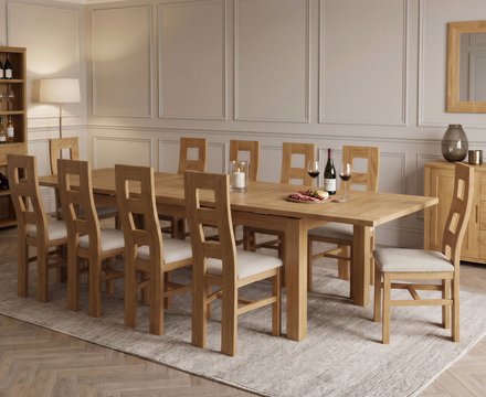Extending buxton 140cm solid oak dining table with 10 linen natural chairs