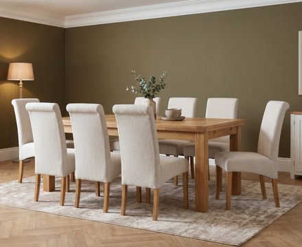 Extending buxton 140cm solid oak dining table with 8 natural scroll back chairs
