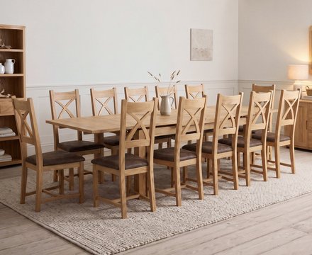 Extending buxton 180cm solid oak dining table with 12 brown natural solid oak chairs