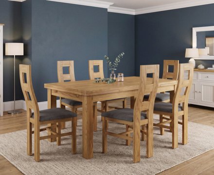 Extending buxton 180cm solid oak dining table with 6 charcoal grey natural chairs