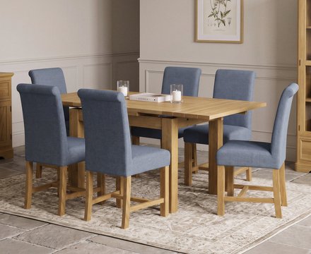 Extending buxton 90cm solid oak dining table with 6 blue braced chairs